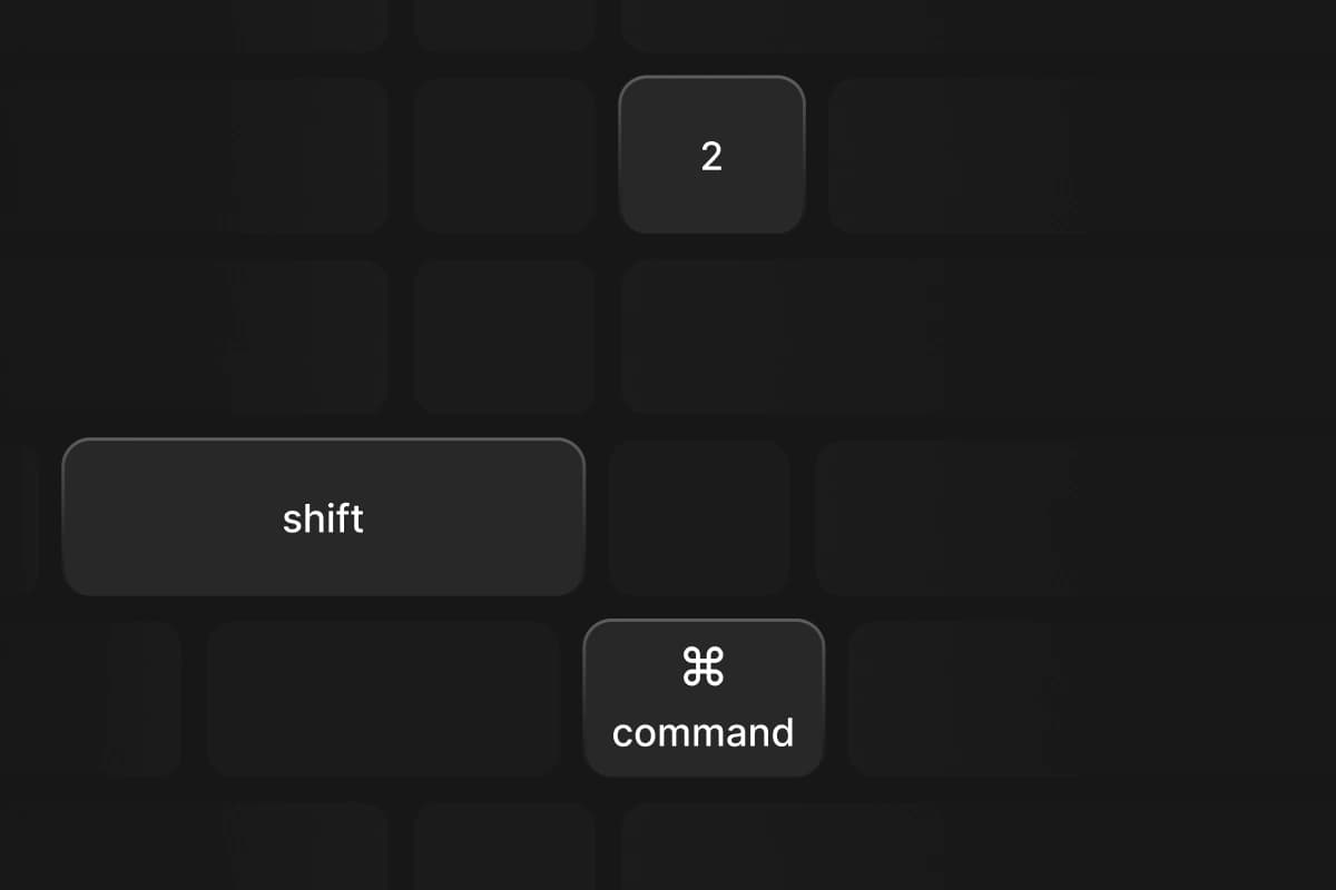 Close-up of Command, Shift, and 2 keyboard keys used to trigger capture