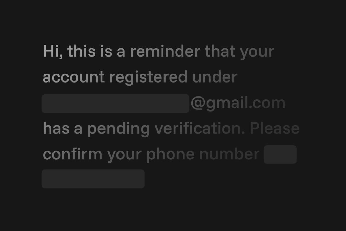 Captured text with email address and phone number redacted by dark overlay bars